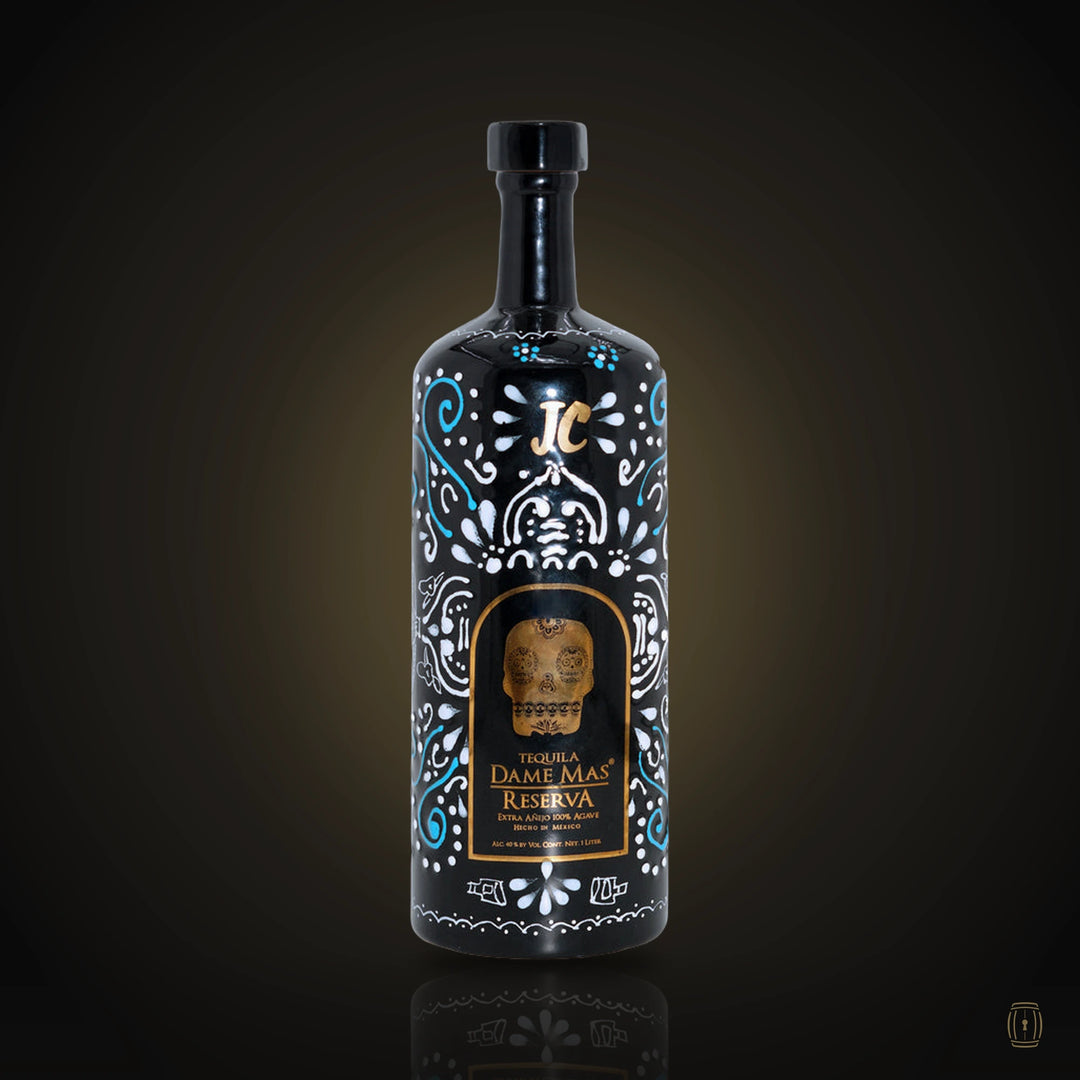 Dame Más Reserva extra añejo tequila black ceramic bottle with gold skull
