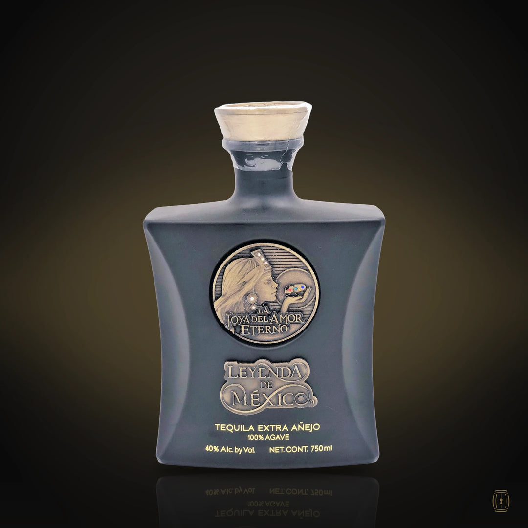 Leyenda de México Añejo tequila black bottle with copper Sol y Luna medallion